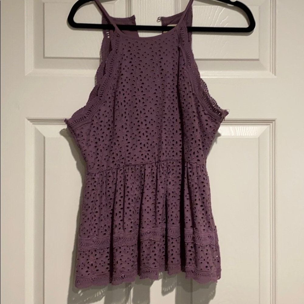 Peplum eyelet top